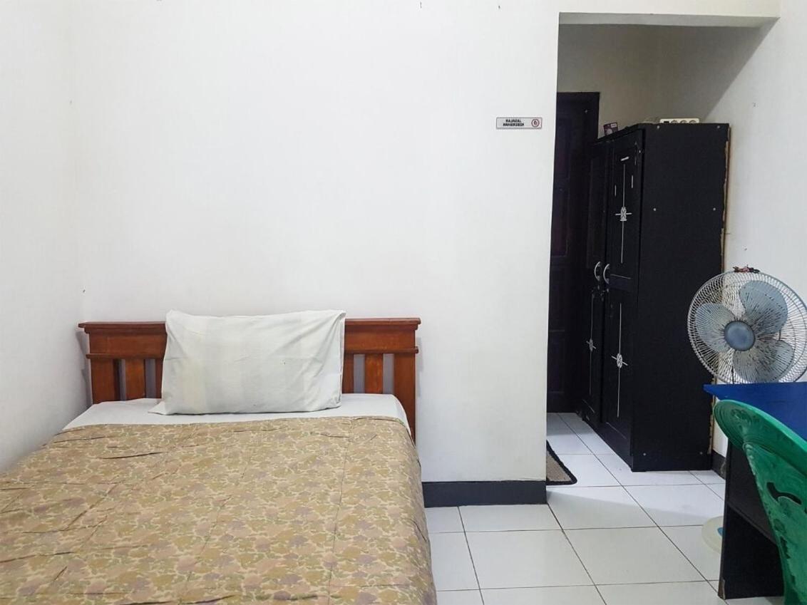 Spot On 93997 Sutangkas Kost Hotel