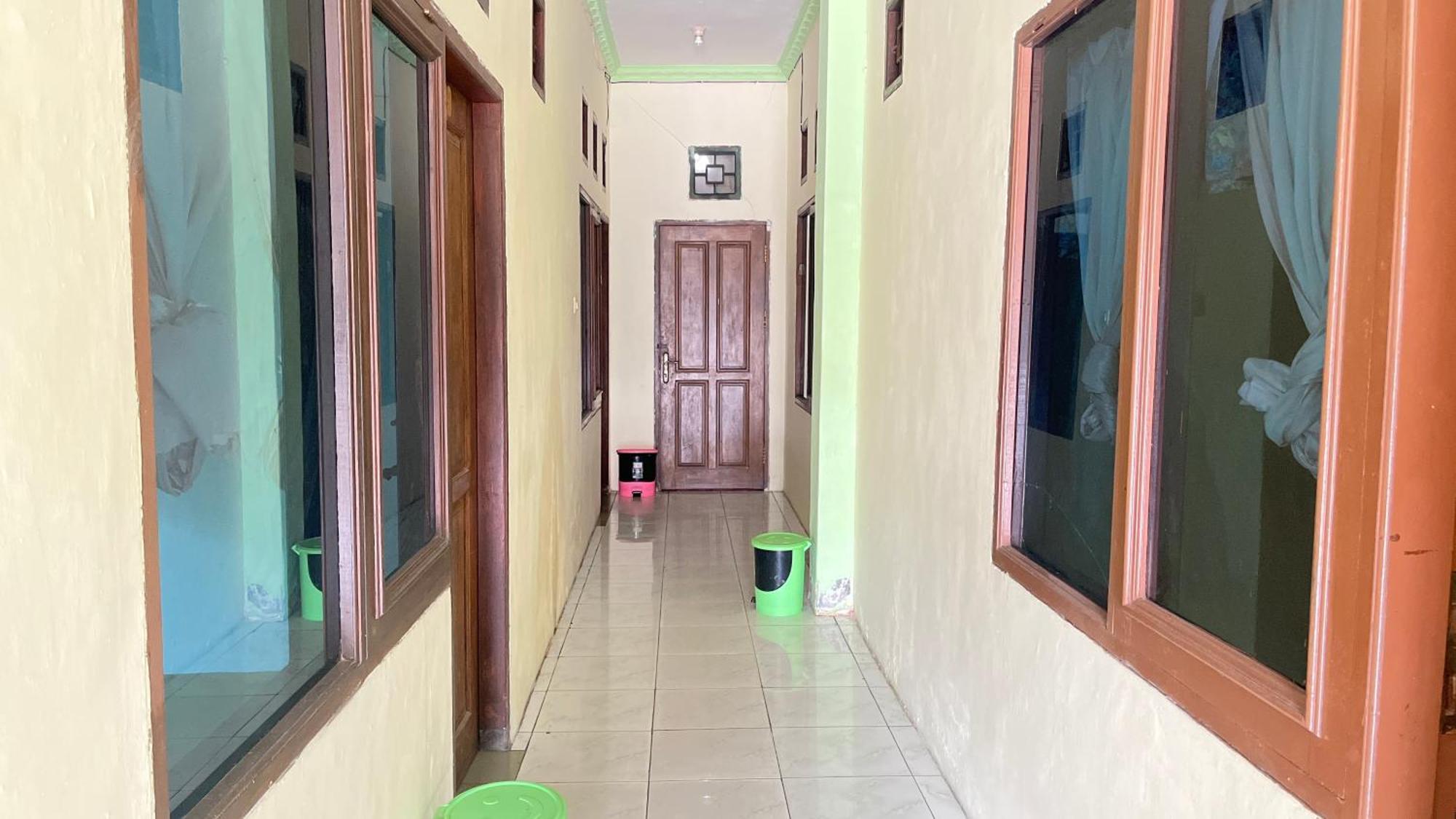 Spot On 93997 Sutangkas Kost