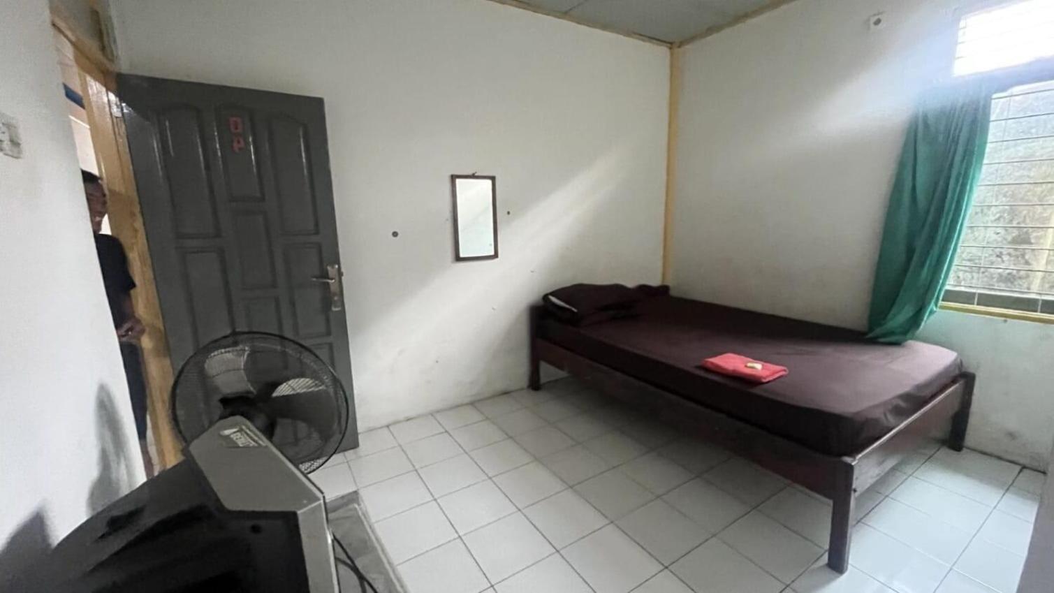 Hotel Spot On 93997 Sutangkas Kost